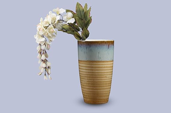 Handmade brown ceramic vase with wooden texture by Caffeine, perfect for modern home décor and stylish floral arrangements.