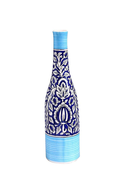 A handmade blue ceramic vase with a floral Mughal design, featuring a glossy finish and blue trim.