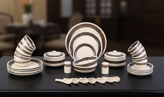 Premium handmade stoneware 37-piece dinner set by Caffeine in food-safe glazing.