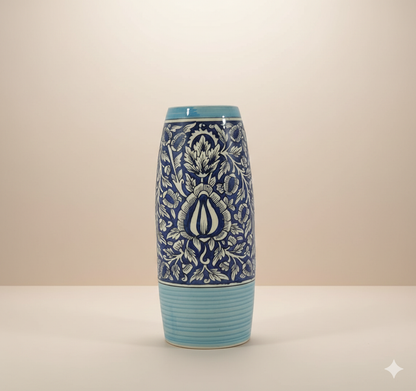 Ceramic vase with blue and white floral patterns on a beige background