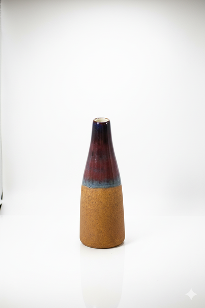 Two-toned ceramic vase on a white background