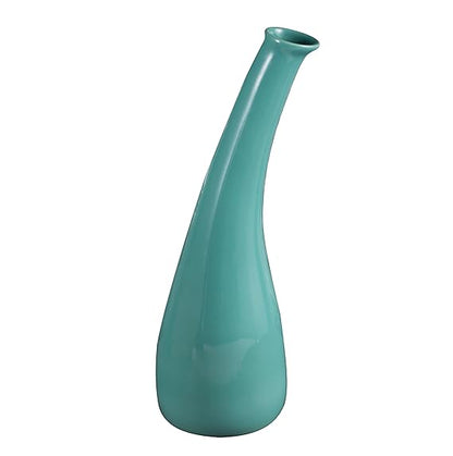A sea green glazed ceramic moulded vase with a smooth finish and perfectly shaped edges, standing against a white background.