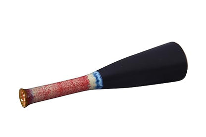 Artistic pottery vase in red and black.