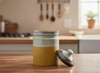Ceramic jar with a lid on a kitchen counter